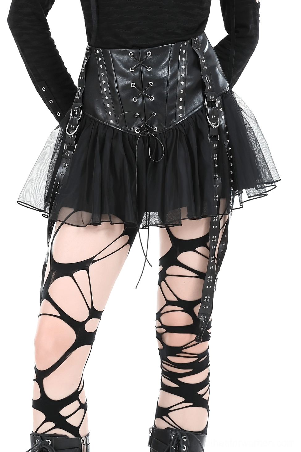 Black lace-up corset tulle mini skirt front view on model showing studded straps and mesh construction