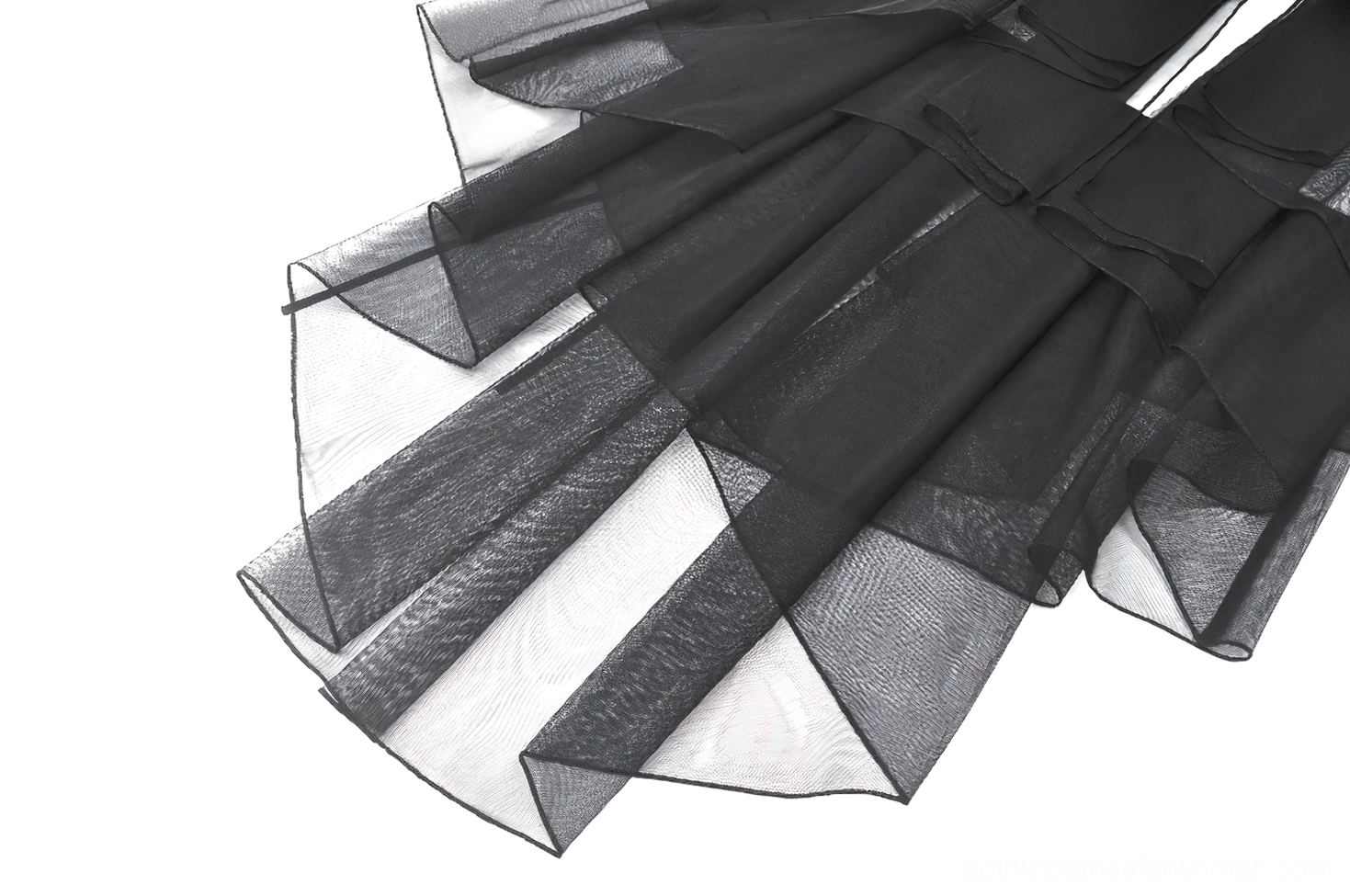 Gothic tiered tulle dress alternative styling detail shot showcasing texture and ruffle construction from fashion perspective