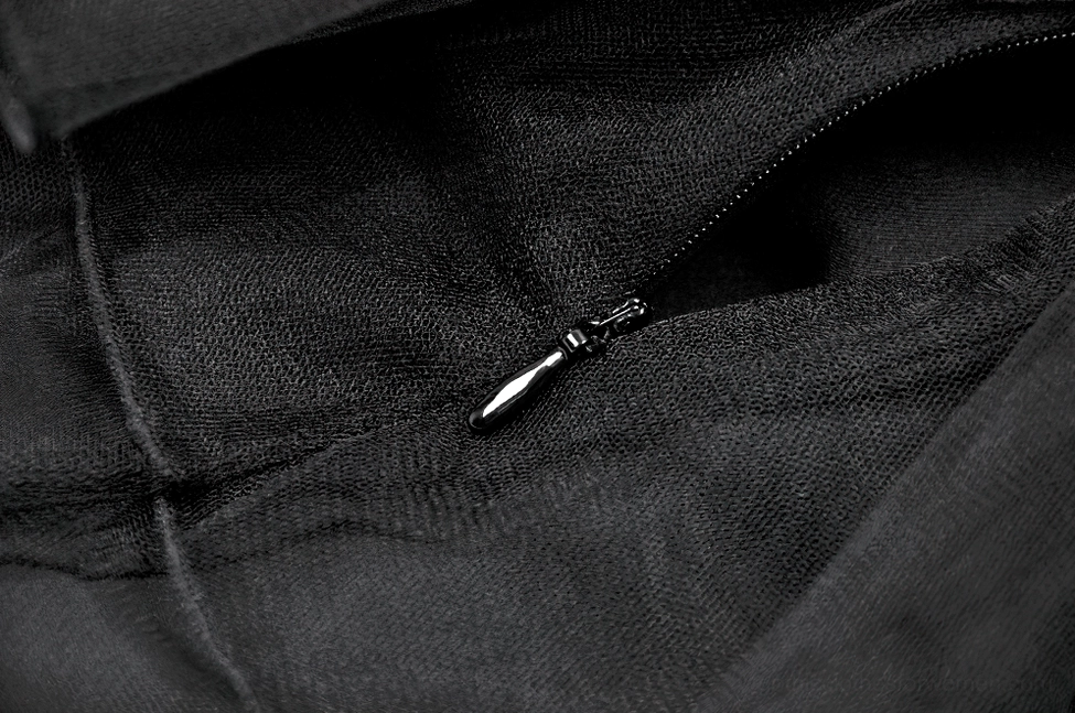 Black gothic tulle mini skirt alternative fashion styling detail emphasizing punk aesthetic and metal hardware