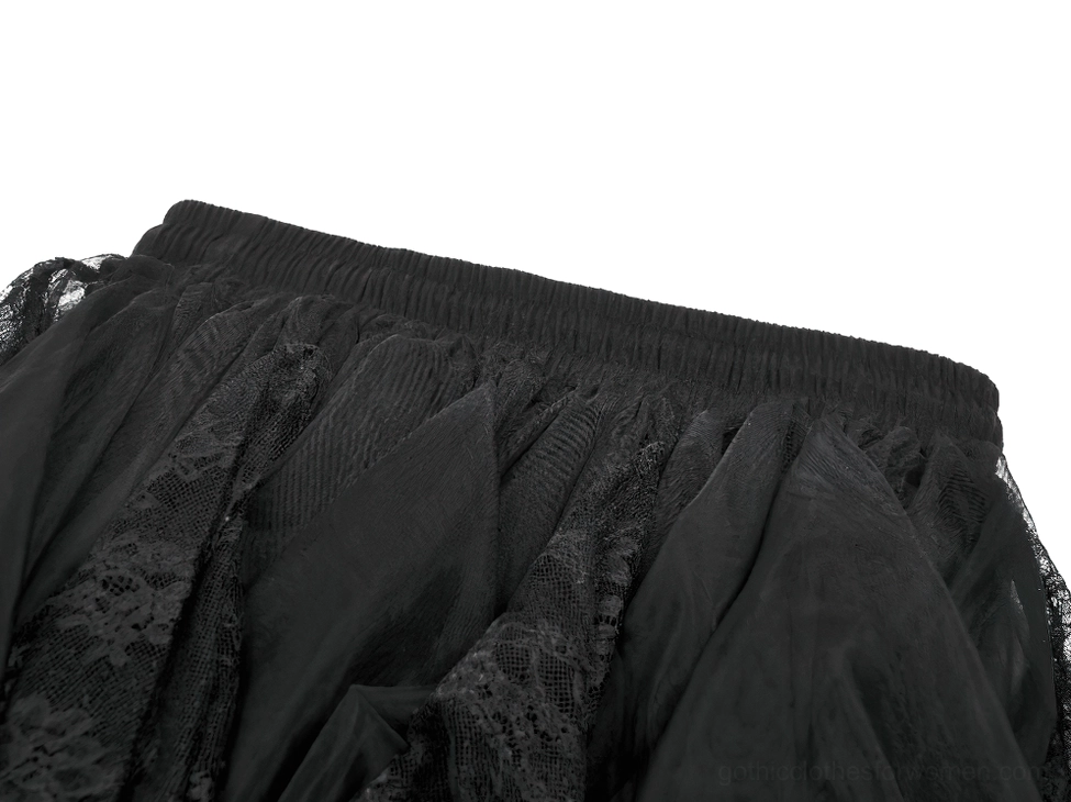 Close-up side view of black gothic tulle skirt showing embossed lace trim and soft tulle material