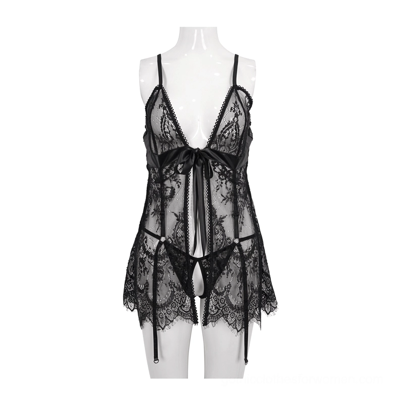 Black lace gothic lingerie set on mannequin displaying scalloped hem and attached garters
