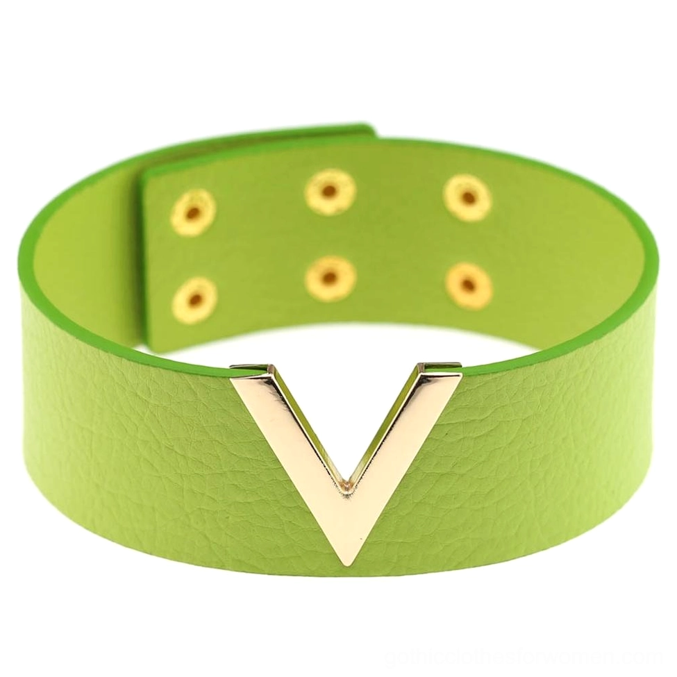 Lime green neon leather V-choker with gold V hardware, cyberpunk goth style choker flat lay photography