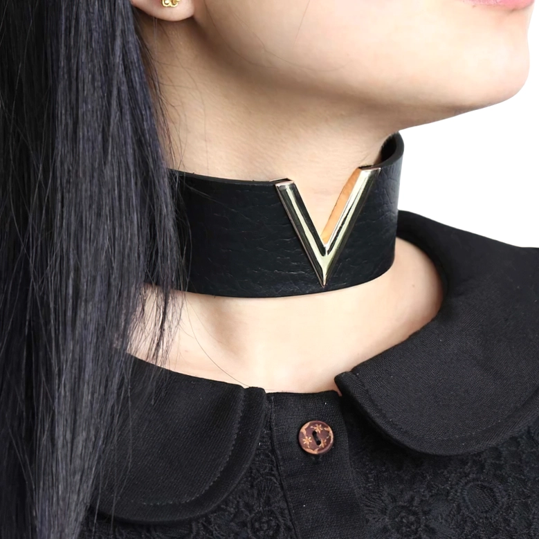 Black V-choker worn on model's neck styled with black goth outfit, close-up showing fit and styling with alternative fashion