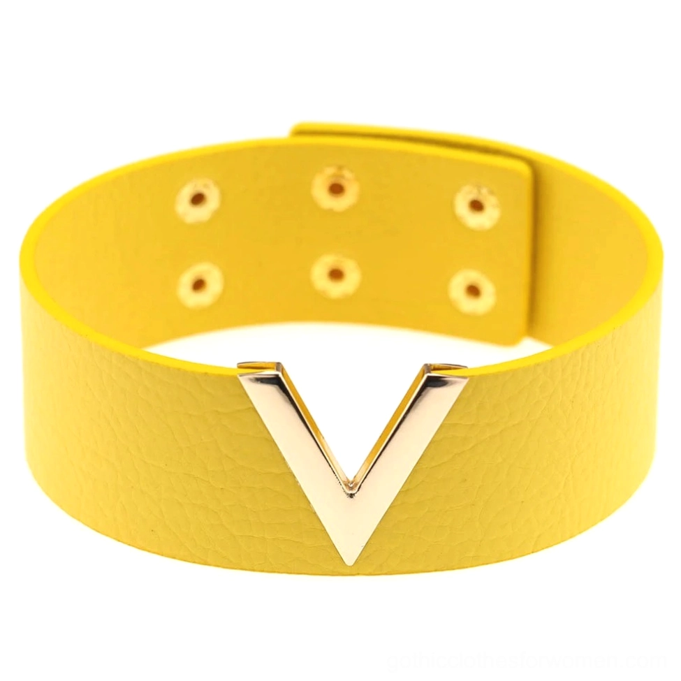 Yellow leather V-choker with gold hardware and adjustable snaps, vibrant gothic fashion accessory flat view