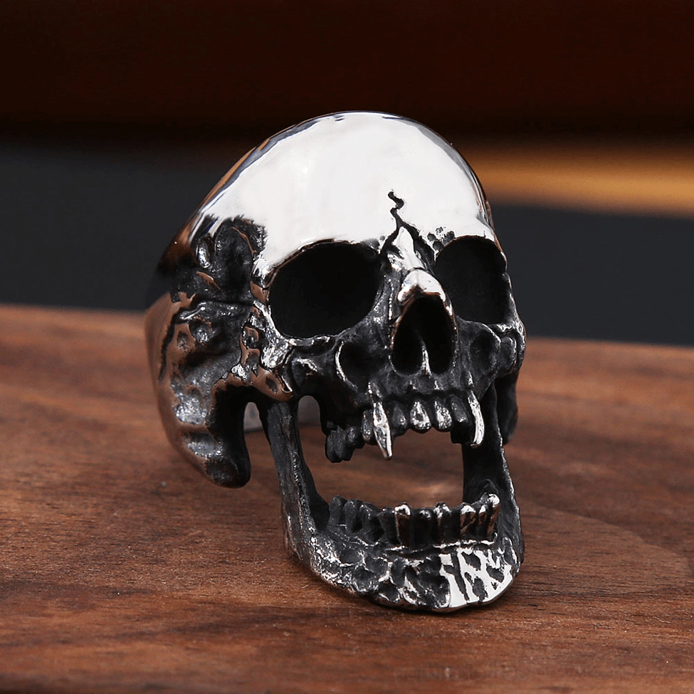 Vampire skull ring front 3/4 view, two-tone silver and black finish with cracked forehead pattern, alternative jewelry
