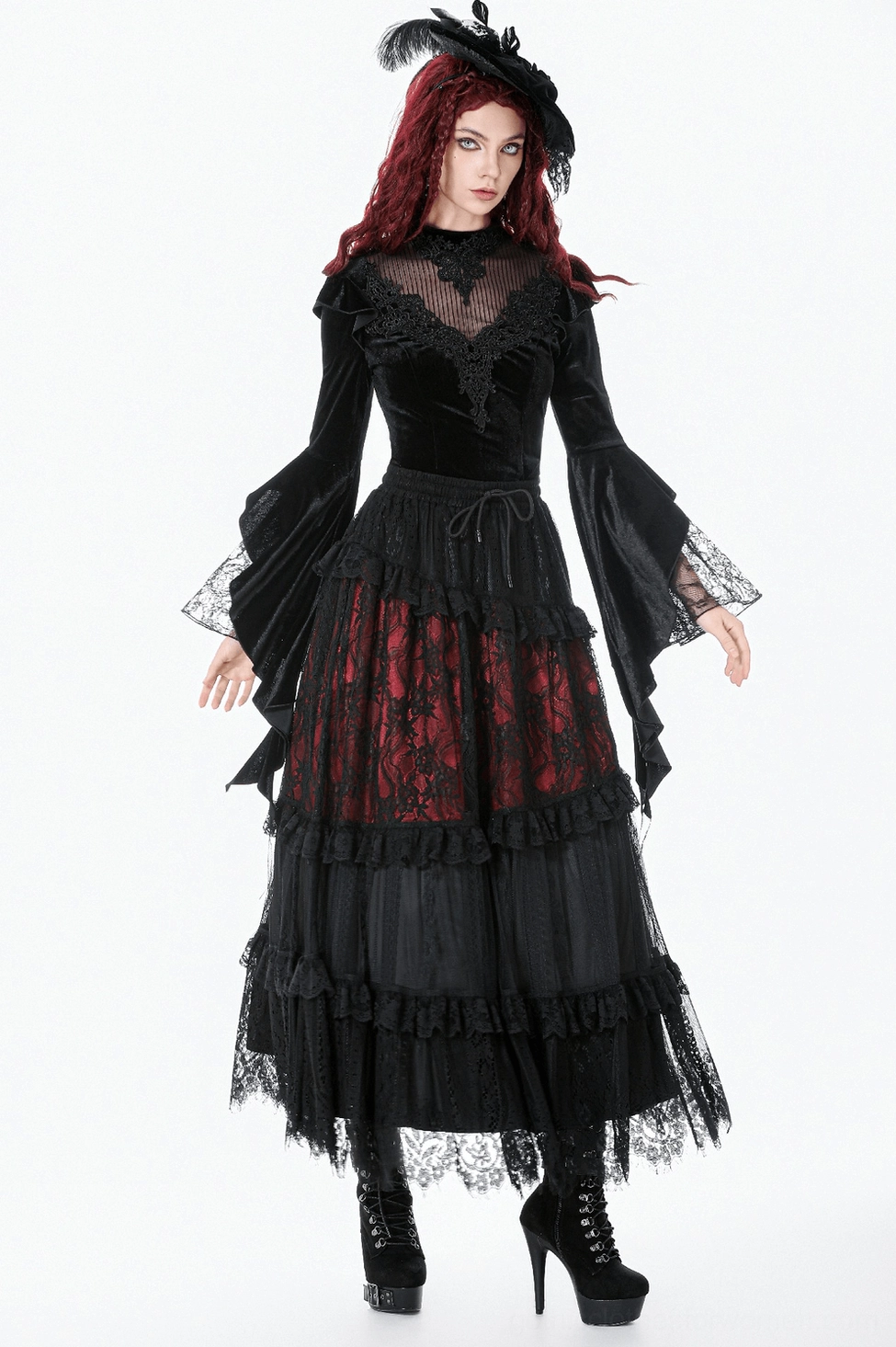 Gothic black velvet bell sleeve top displaying full silhouette with theatrical flared sleeves and fitted waist