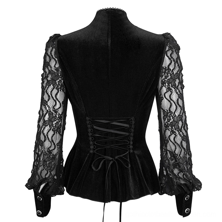 Back panel of black gothic velvet blouse showing corset-inspired lace-up closure and sheer lace sleeve construction