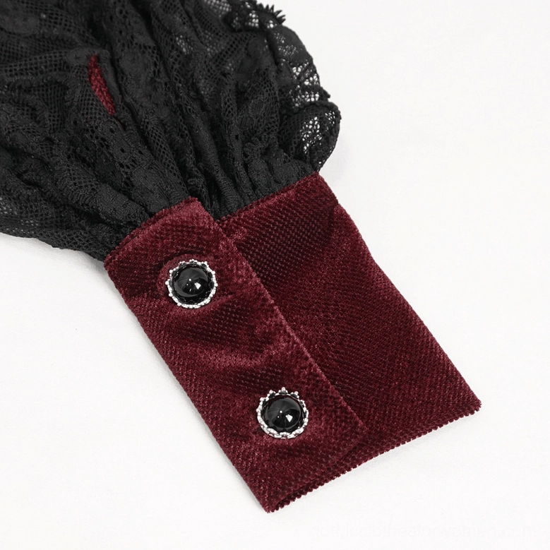 Ornamental jeweled button cuff detail on wine red velvet gothic blouse puff sleeve