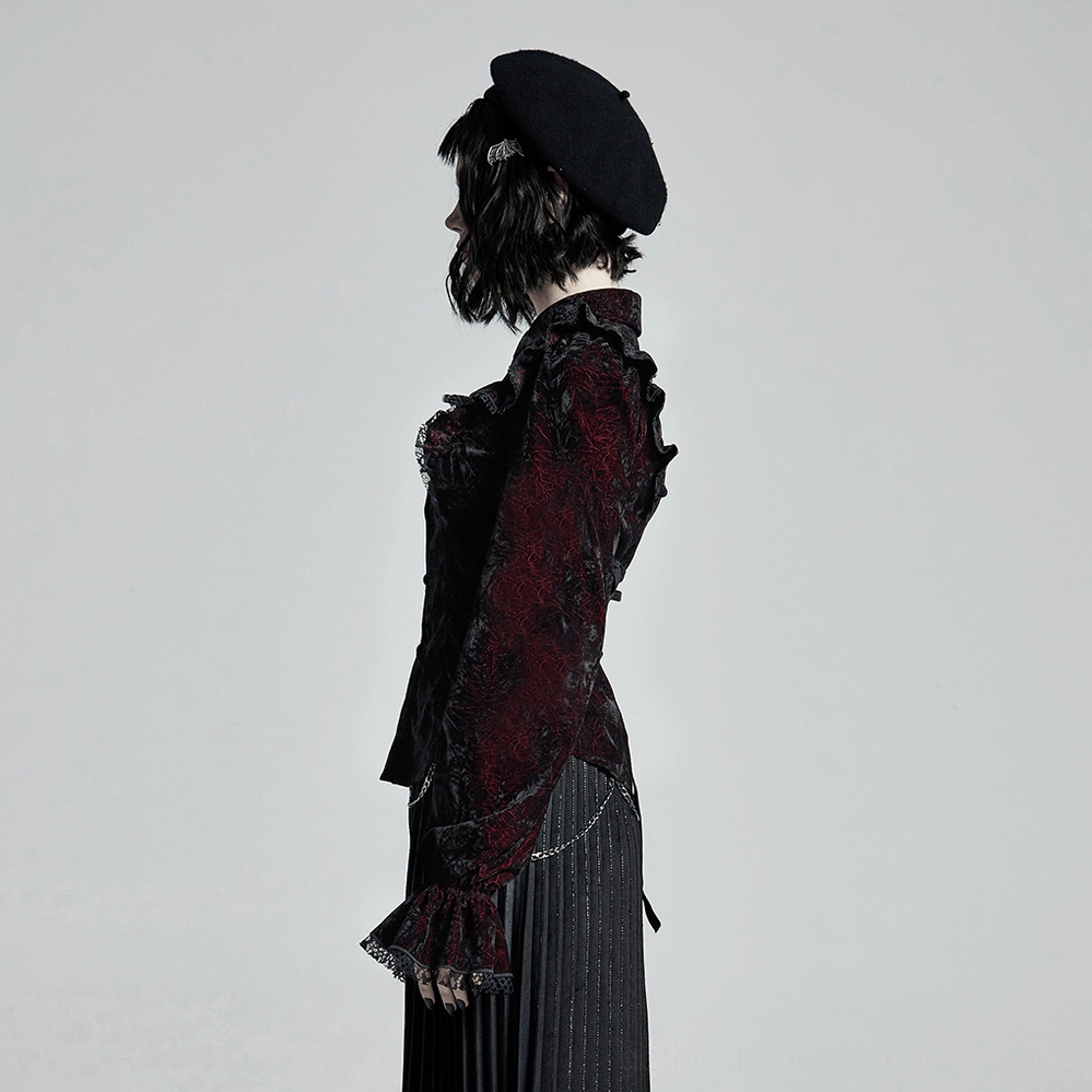 Model wearing burgundy black jacquard velvet gothic blouse with ruffles and lace-up back