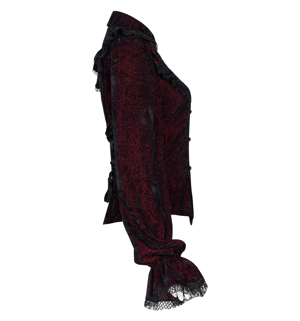 Black jacquard velvet gothic blouse side view showing gathered long sleeves and lace-trimmed cuffs