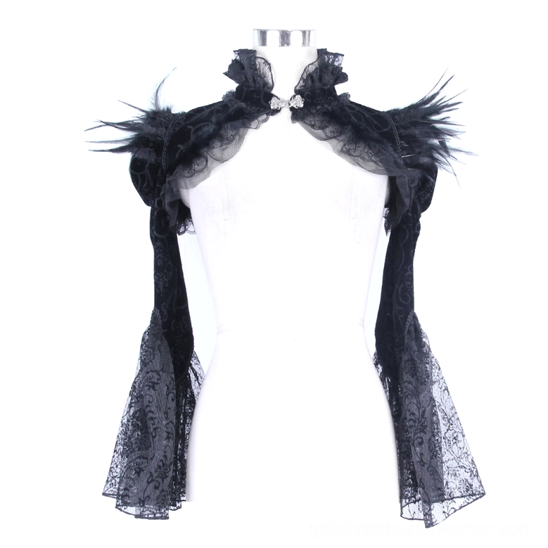 Black velvet gothic bolero shrug with jeweled collar clasp on mannequin front