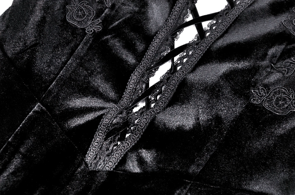Front lace-up and fabric texture close-up of black velvet gothic dress, showcasing embroidered floral patterns and decorative lace trim