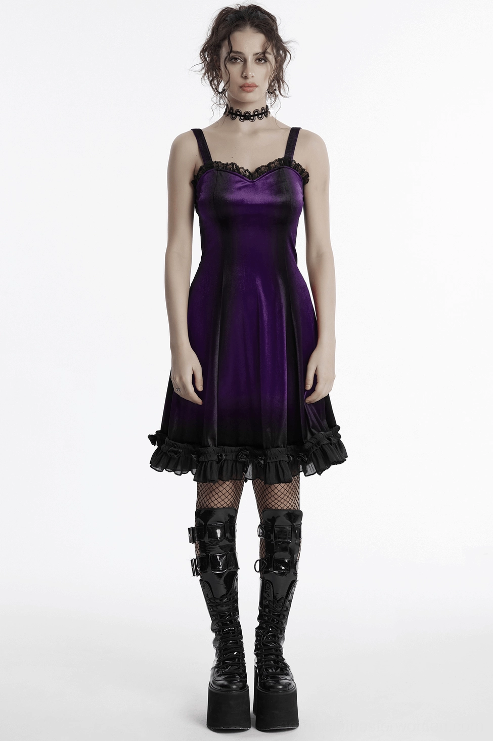 Full-length side view of purple velvet gothic dress showing A-line silhouette and rose hem