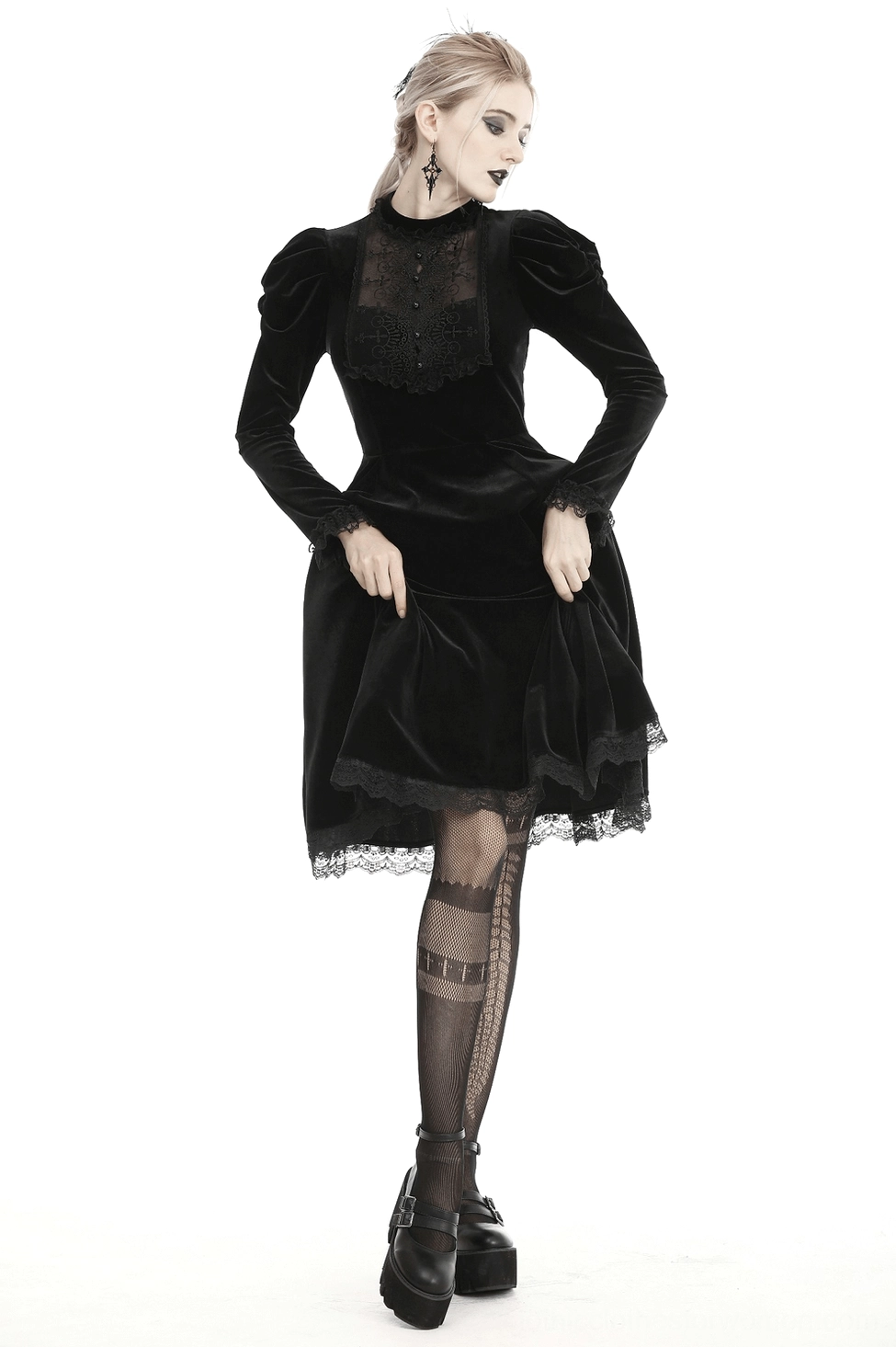 Three-quarter view of black gothic velvet dress with puff sleeves and lace detailing