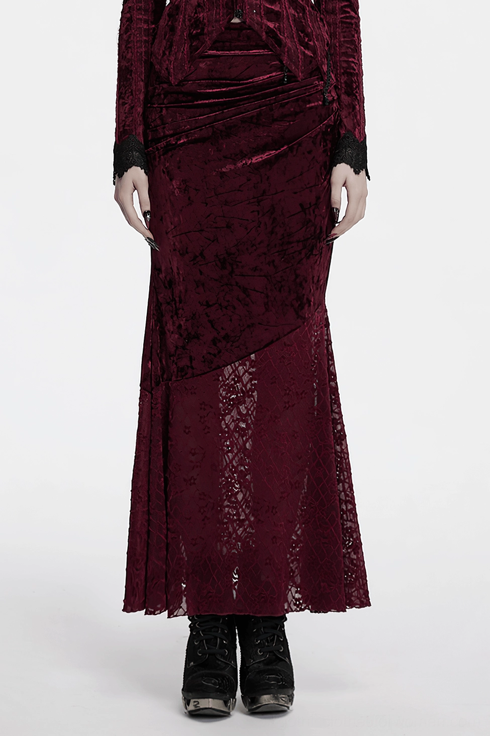 Model wearing burgundy gothic fishtail skirt front view showcasing drape and how the asymmetrical design flatters curves