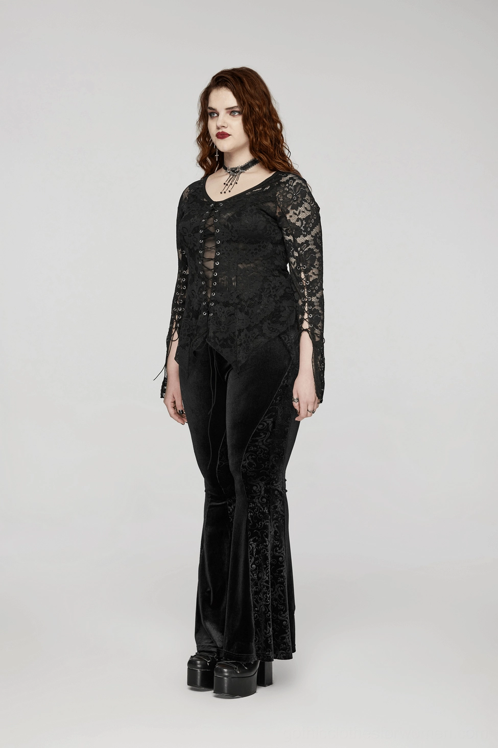 Black velvet gothic pants complete view highlighting hourglass silhouette and dramatic flared hem design