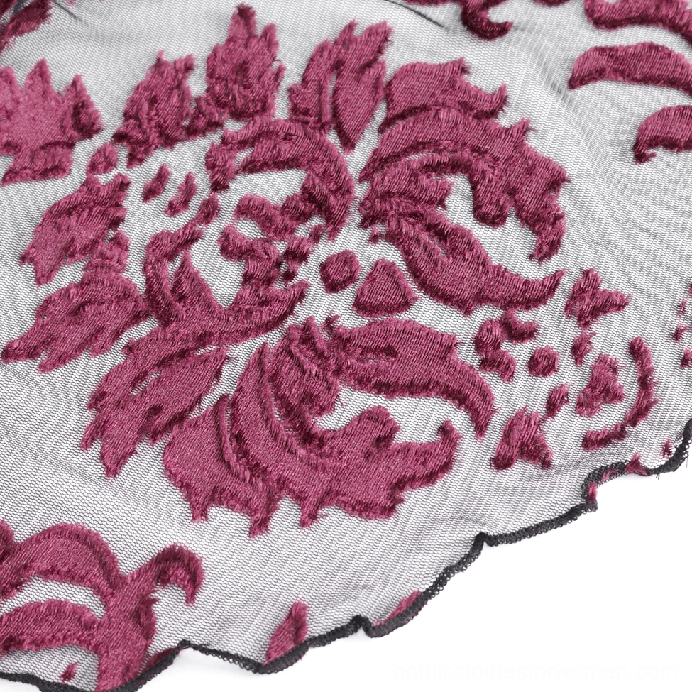 Alternative angle of gothic black velvet top showing embroidered sleeve construction and fit