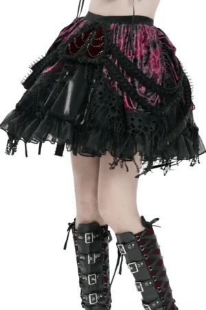 Wine red and black crushed velvet gothic layered mini skirt with lace ruffles, three-quarter front view on model