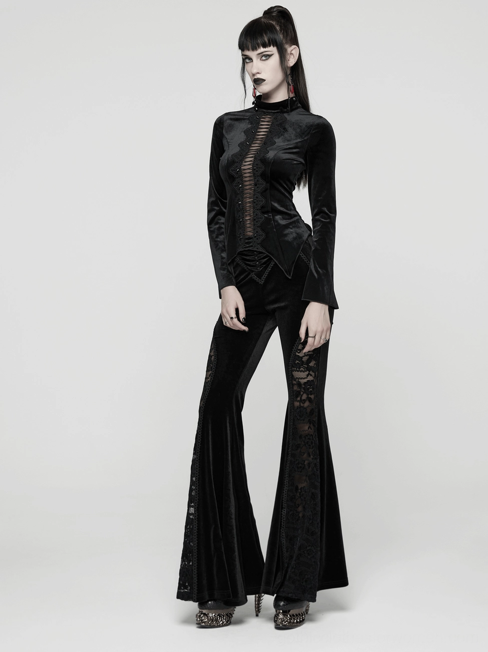 Full length view of black gothic velvet long sleeve top with pointed hem on mannequin
