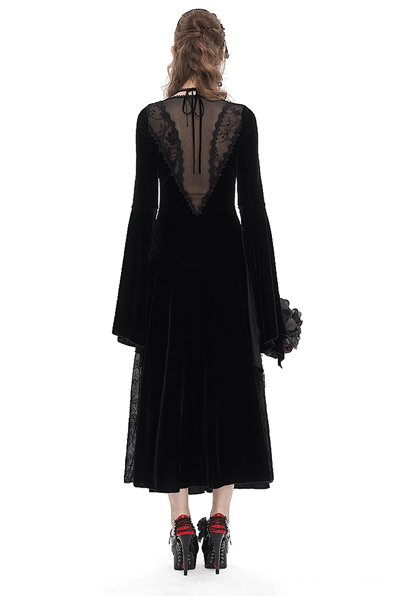 Gothic velvet maxi dress back view featuring sheer lace back panel and tie-neck closure on model