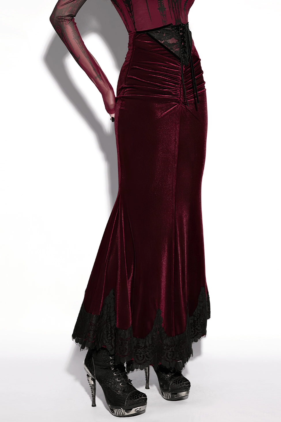 Full-length product showcase of burgundy velvet gothic mermaid skirt with emphasis on dramatic fishtail hem and overall silhouette