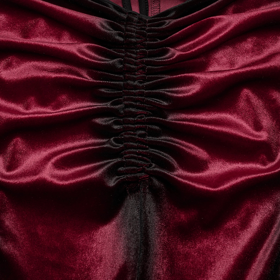 Close-up of center front ruched gathering on wine red gradient velvet gothic pants