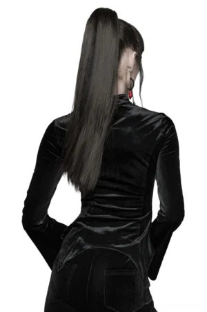 Black gothic velvet long sleeve top with pointed asymmetrical hem and back view, rear angle on model