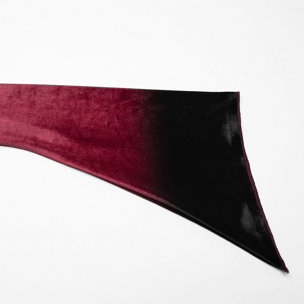 Single long sleeve of burgundy ombre velvet gothic top showing spiral design, wine-red to black gradient, and pointed irregular cuff