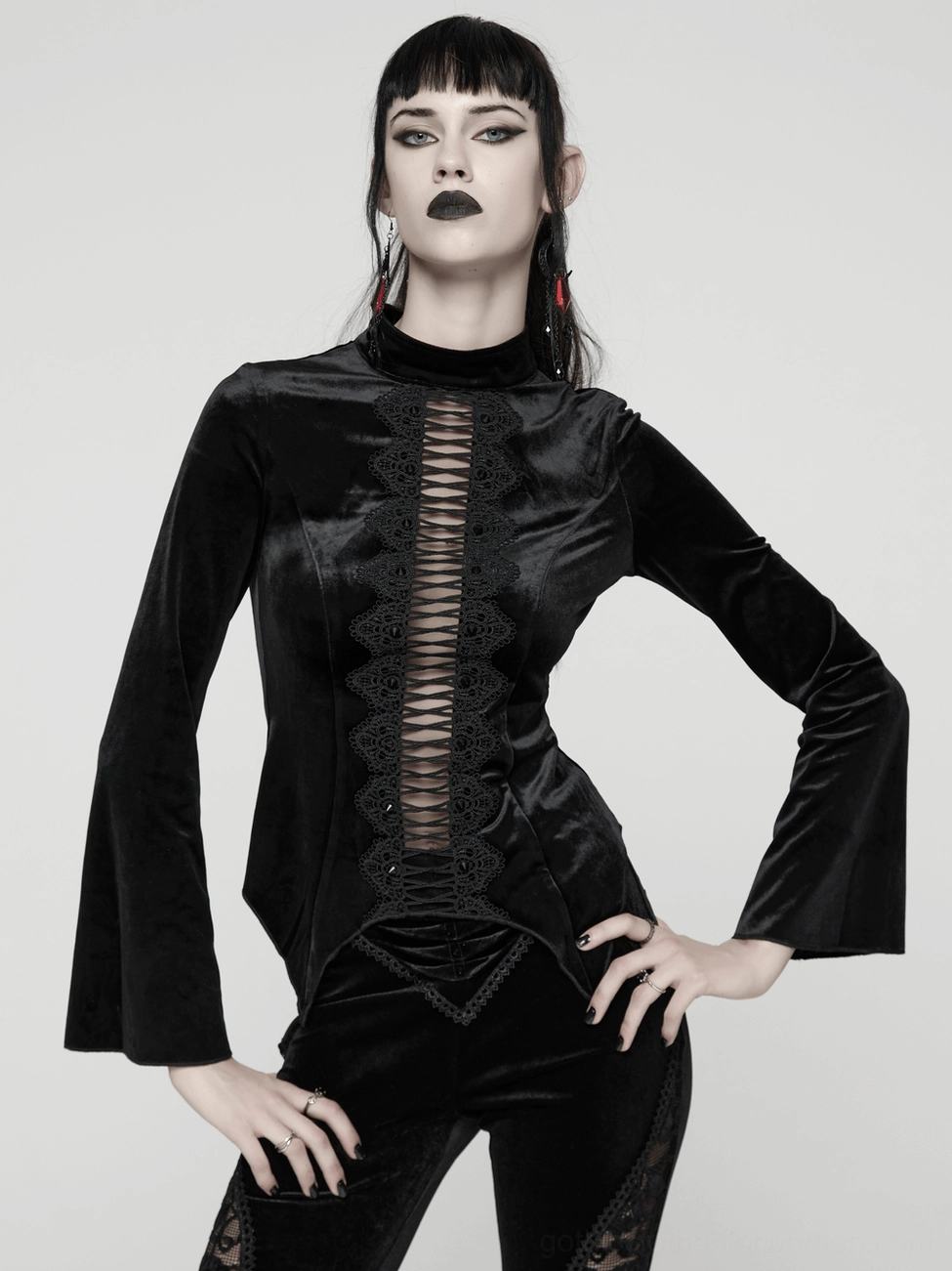 Black velvet gothic top with stud accents and lace cutout styling detail shot