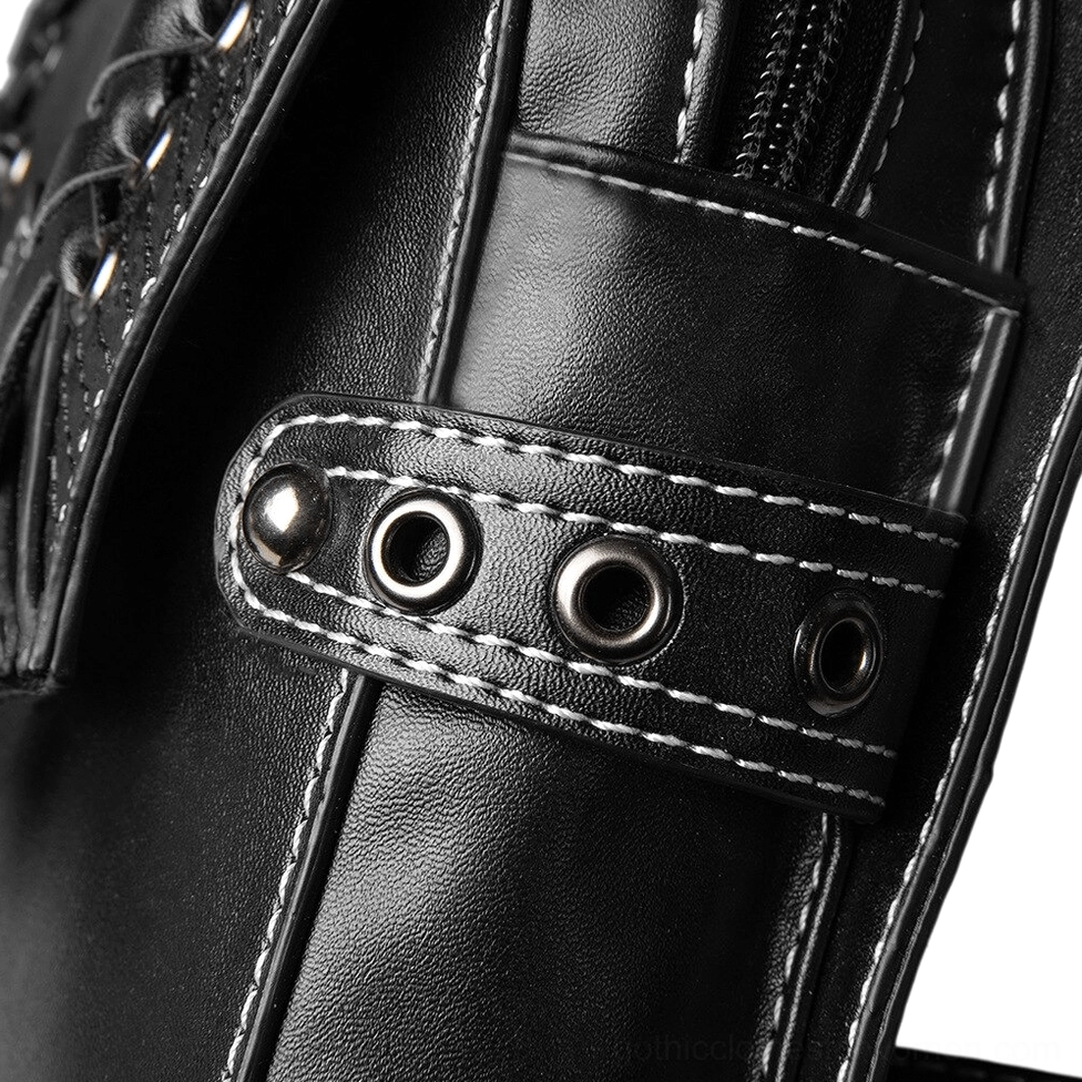 Black gothic skull waist bag showing snakeskin texture and rivet embellishments