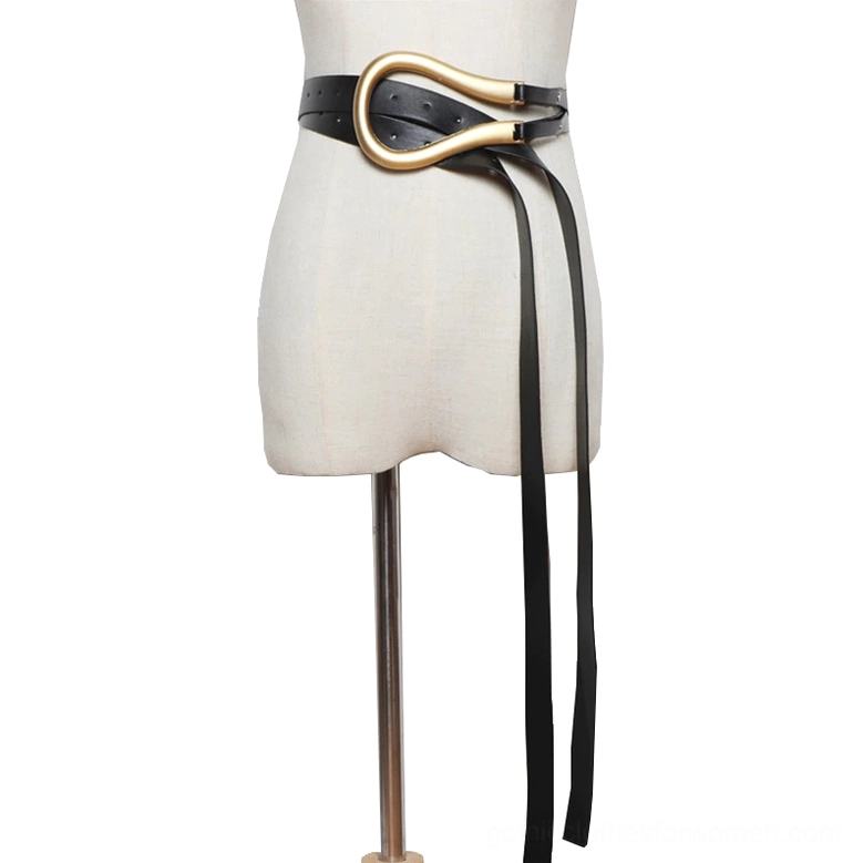 Dark leather belt with gold metal buckle displayed on mannequin side view, dual hanging straps demonstrating styling versatility