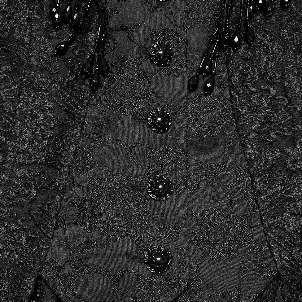 Close-up detail of gothic waistcoat front placket showing ornate resin buttons and paisley jacquard fabric