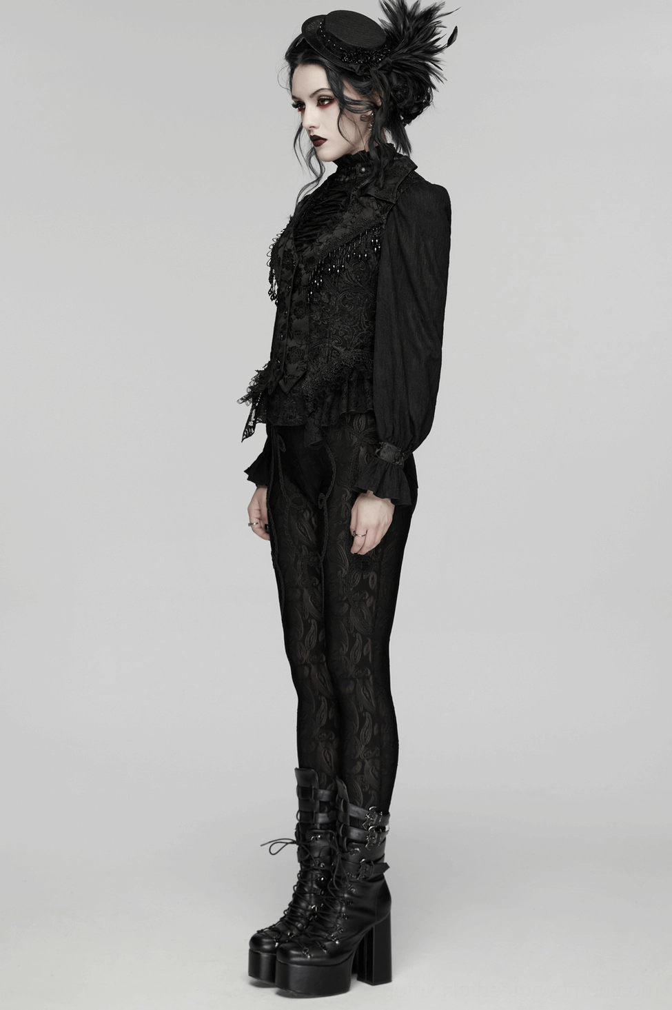 Gothic waistcoat detail showcasing embroidered lace fabric, ornate embellishments, and construction quality