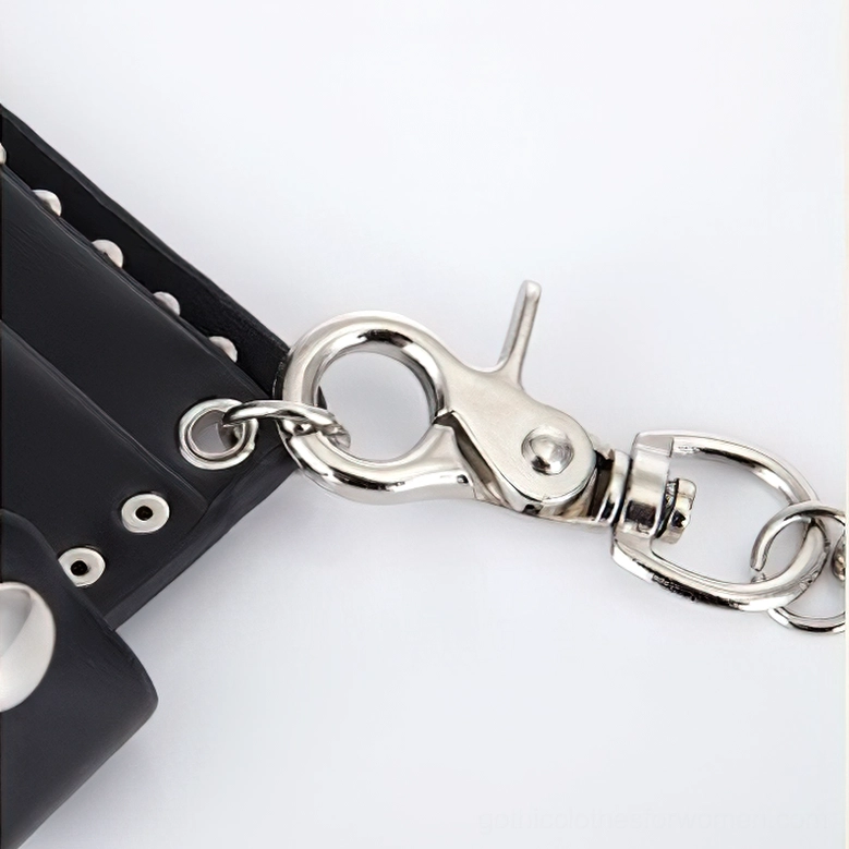 Close-up detail of silver metal snap clasp hardware attached to gothic wallet chain