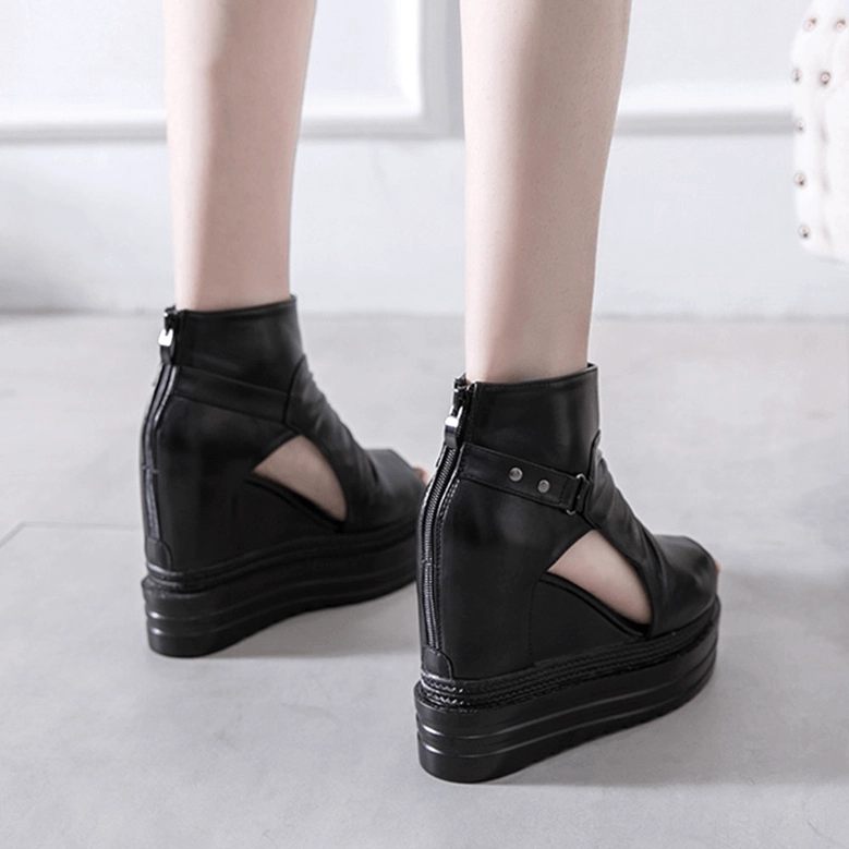 Gothic wedge ankle boots rear view showing zipper closure and side cutout detail