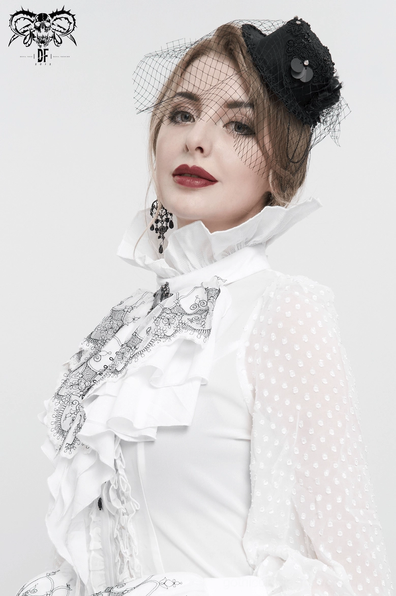 Female model wearing gothic white jabot neckwear, alternative fashion styling with ruffled Victorian collar