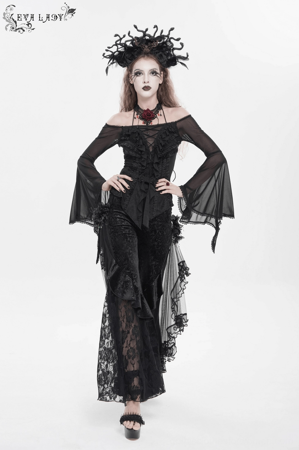 Black gothic wide leg pants front detail showing high waist and flocked scroll texture pattern