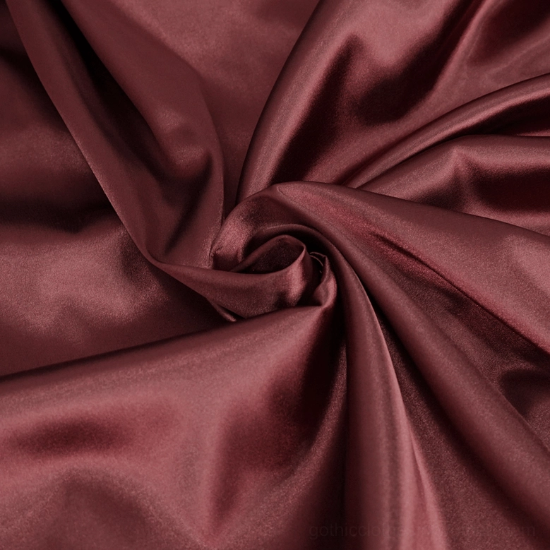 Wine red gothic maxi dress full length side profile, showcasing trumpet lace sleeves and flowing silhouette