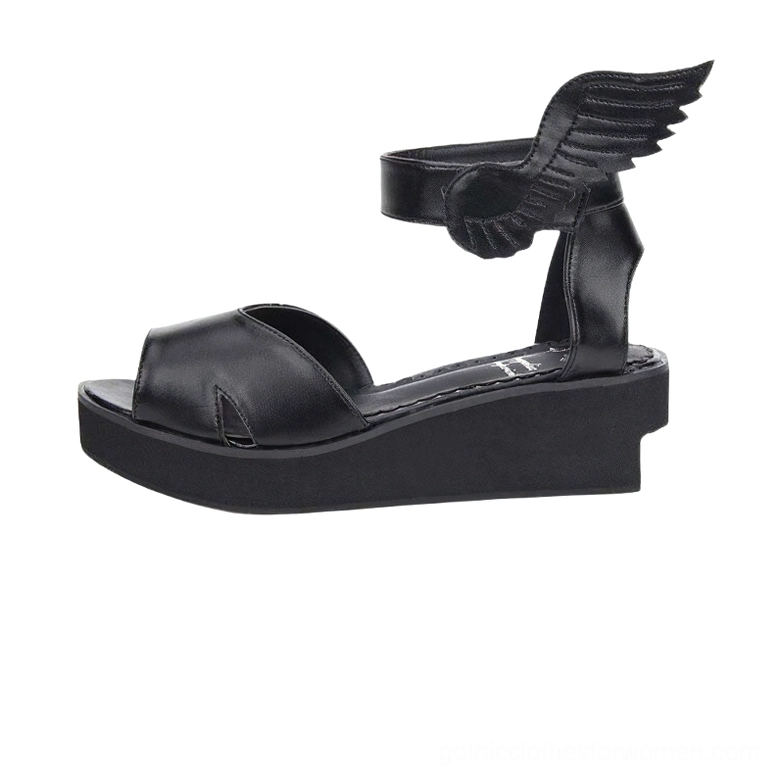 Black matte leather winged sandal side profile highlighting minimal open-toe design, wing ankle strap, and platform wedge silhouette