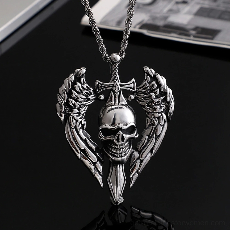 Winged skull necklace with twisted silver-toned rope chain on glossy black surface, front upright flat lay with reflection