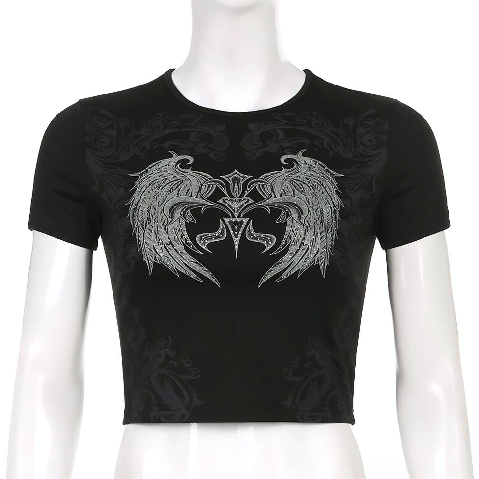 Gothic wings crop top on dress form - detailed front view of silver wing graphic with damask background pattern