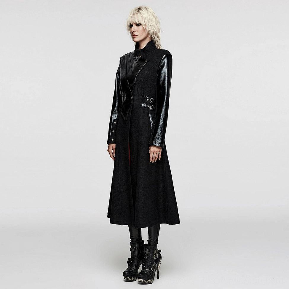 Black gothic winter coat detail showing stand collar, faux leather panels, and tailored shoulders