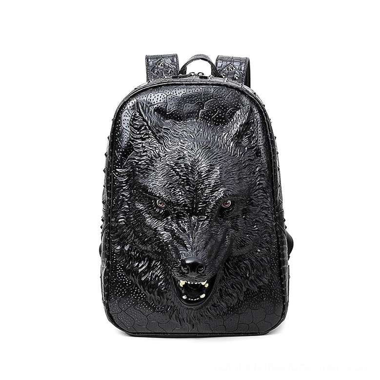 Black 3D wolf head gothic backpack front view with crocodile textured PU leather and studded details