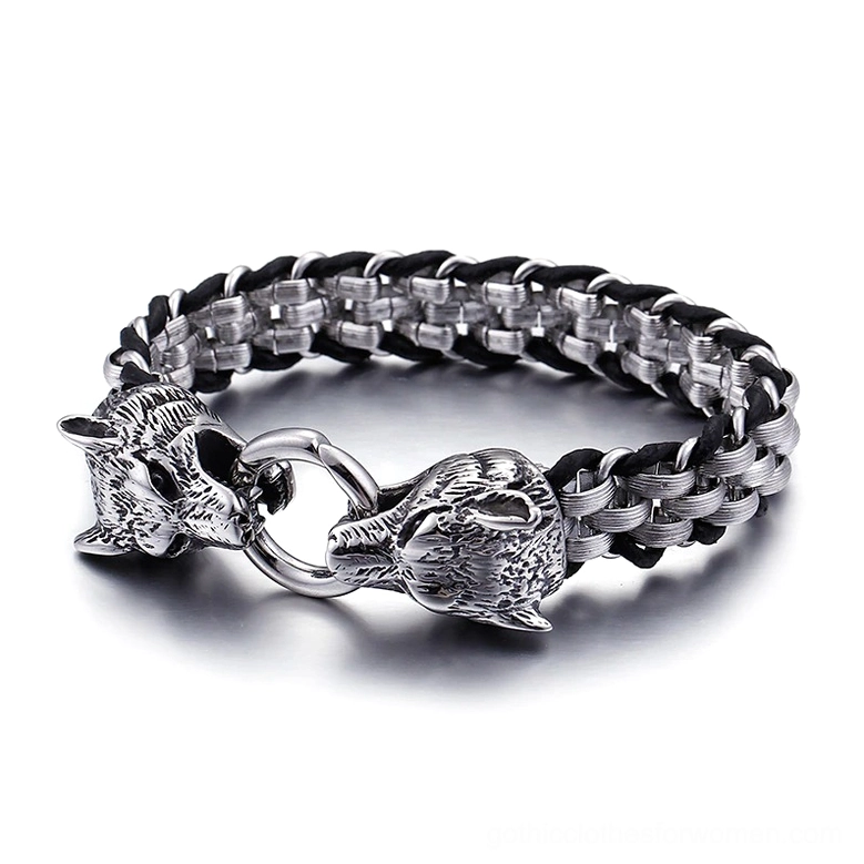 Gothic wolf head stainless steel leather bracelet with dual wolf clasp, braided metal and leather weave design, top-down view