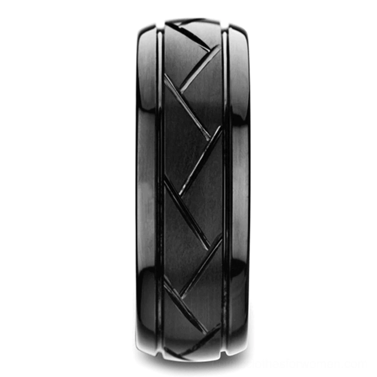 Gothic zigzag ring front view showing detailed chevron engraving pattern, black metal