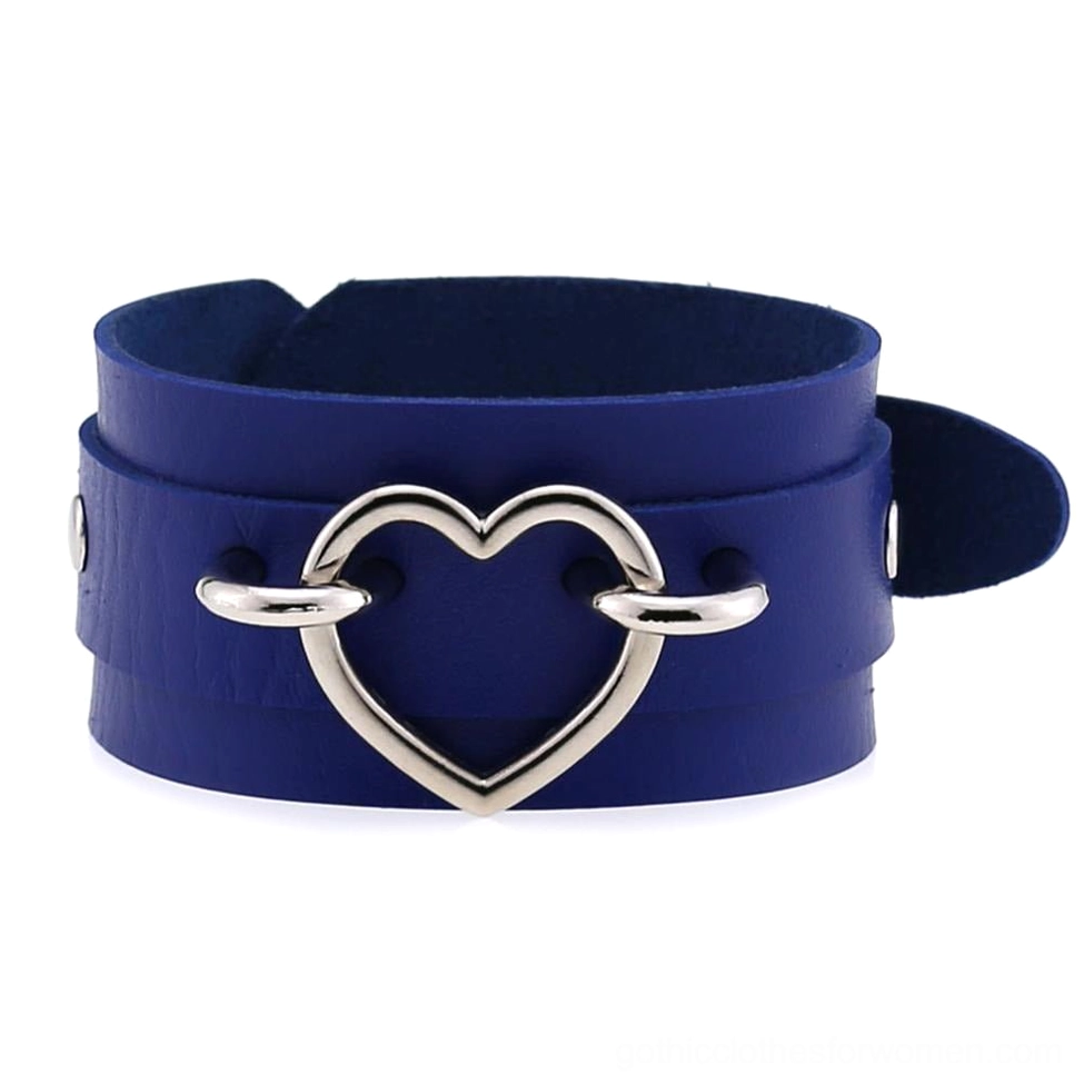 Green leather gothic heart cuff bracelet with silver heart detail, nature-inspired witchy goth style