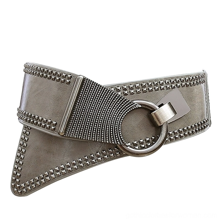 Dusty grey studded wide elastic belt with silver hardware and decorative rivet trim, flat lay display view