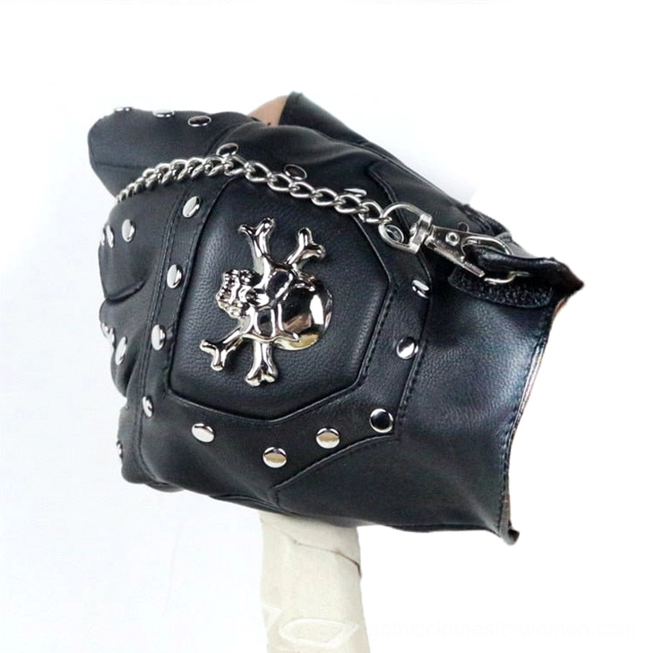 Single half-finger gothic glove with large silver skull emblem and metal rivets - side close-up detail view