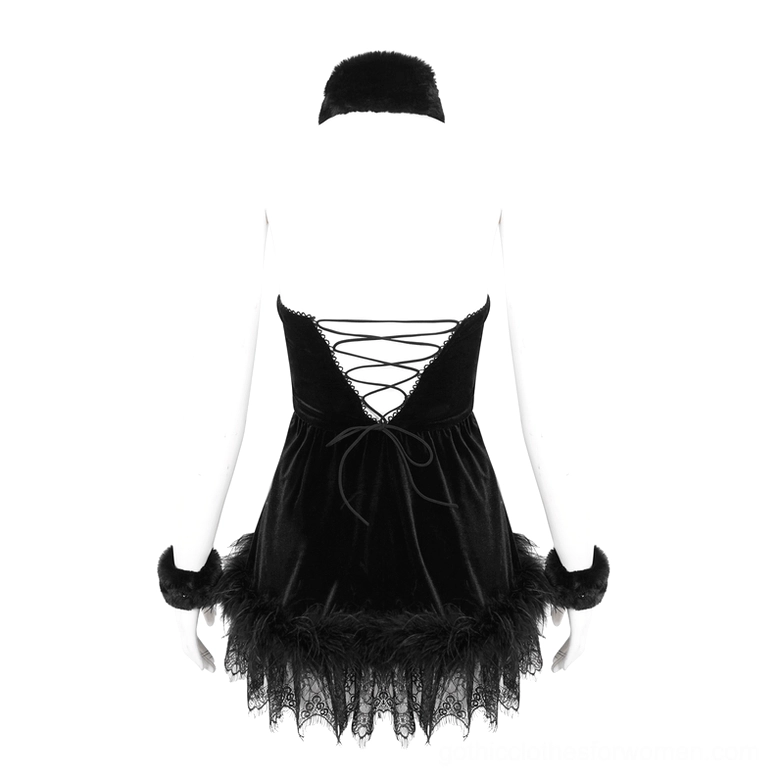 Black gothic dress back view on mannequin displaying open back lace-up construction and flared velvet skirt