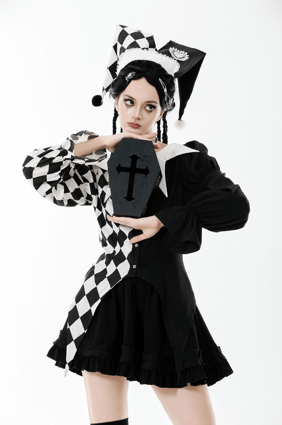 Black and white harlequin jester hat textile detail showing polyester spandex fabric quality
